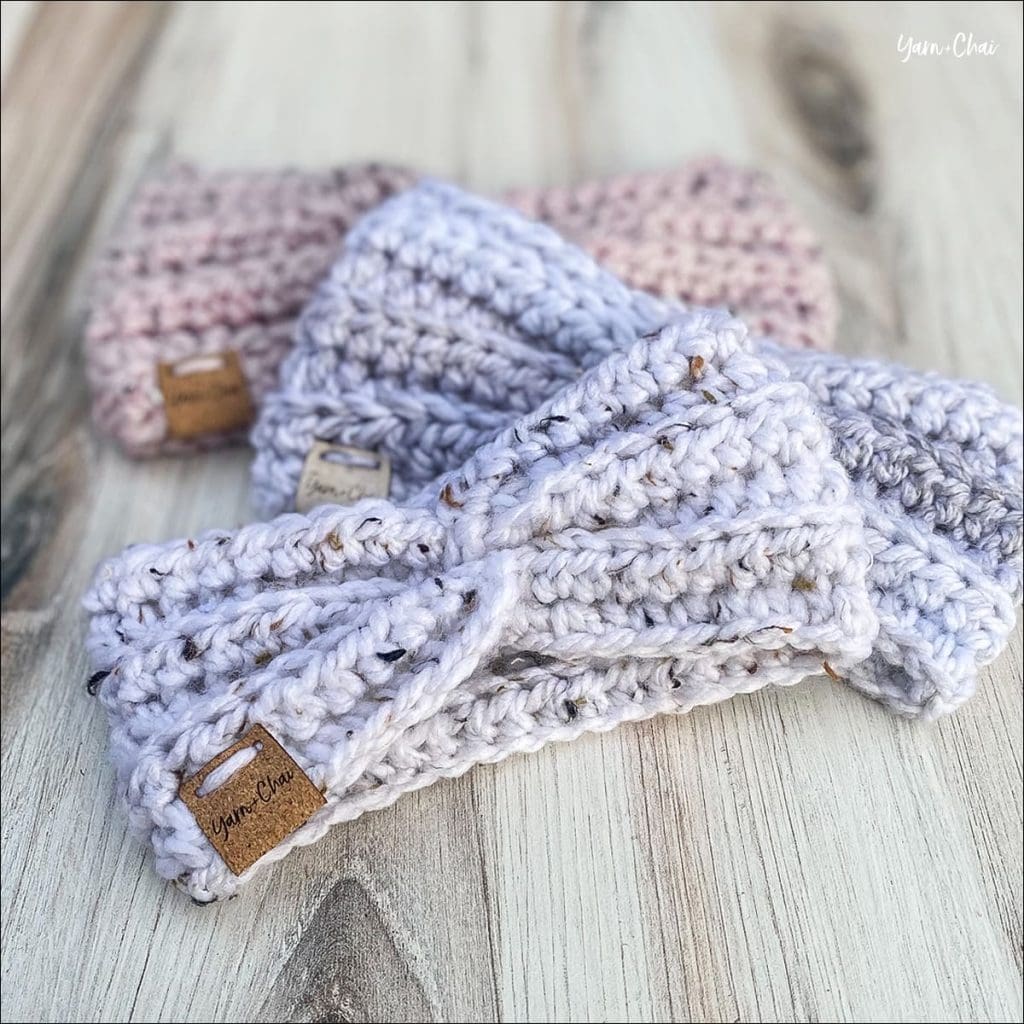 Three crocheted ear warmers